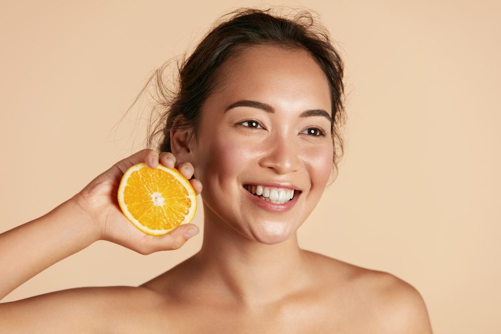 Woman showing how to Improve Skin Elasticity On Face Woman showing how to Improve Skin Elasticity On Face